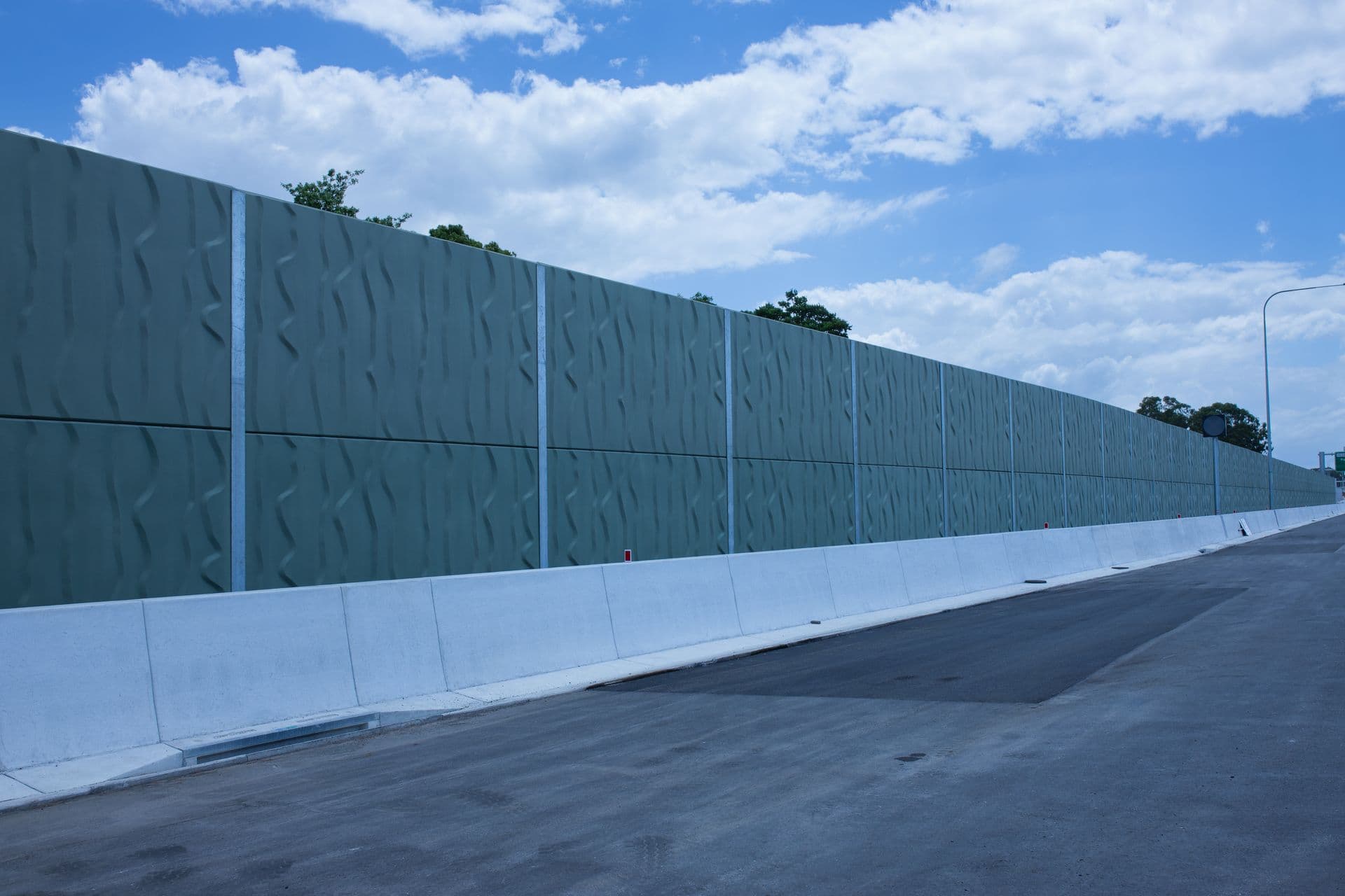 Palm Beach to Tugun textured green concrete noise barrier panels