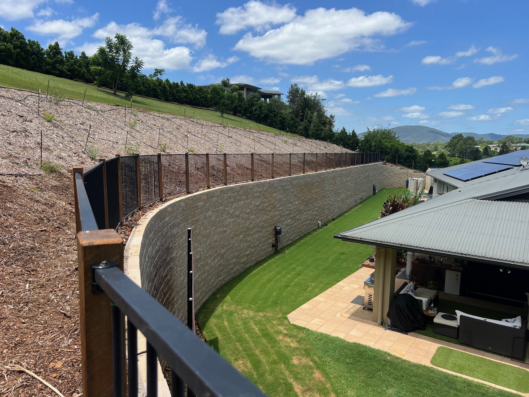 Holmview reinforced soil segmental block retaining wall