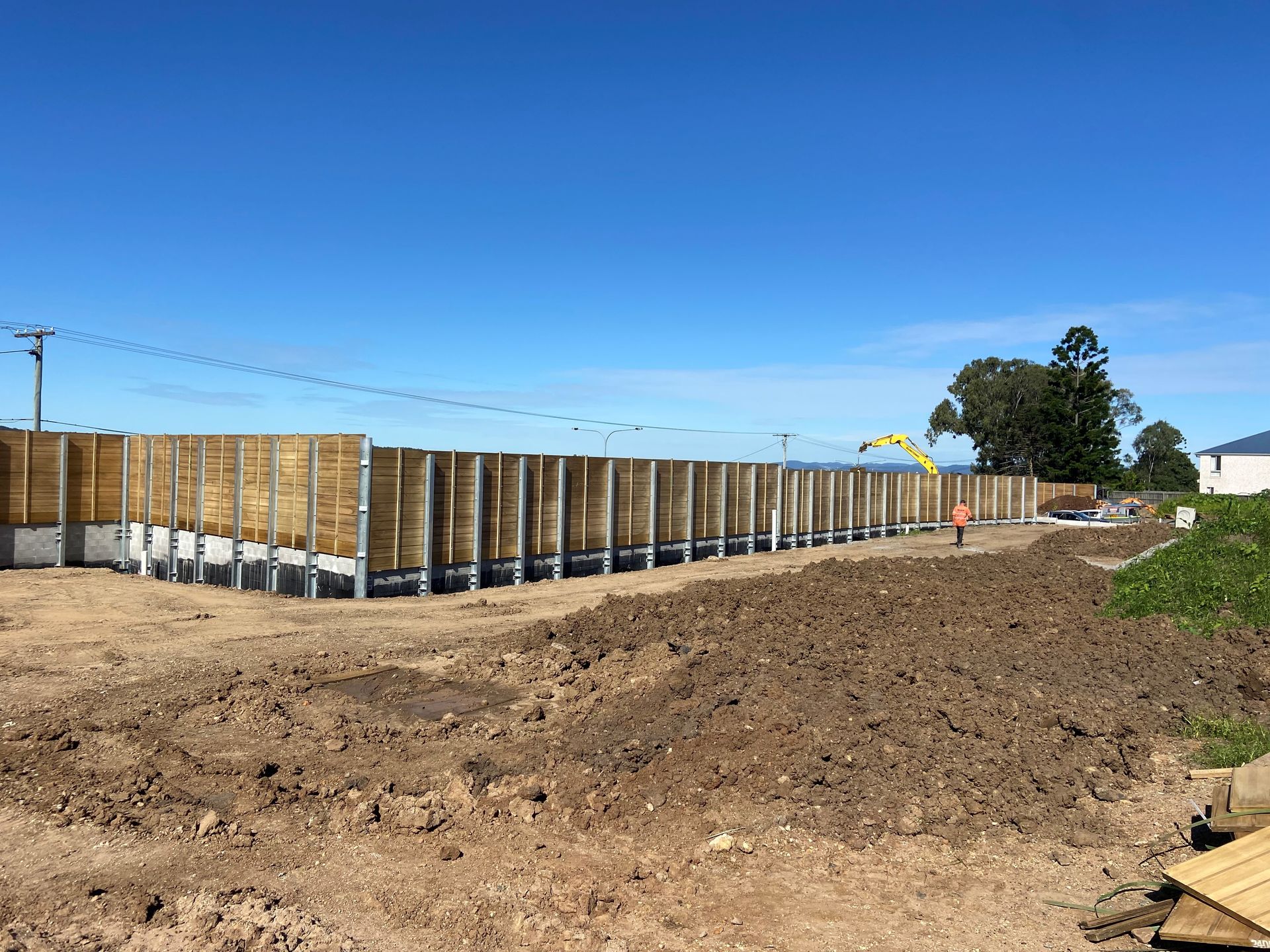 Torville Heights timber ply noise barrier with steel posts during construction